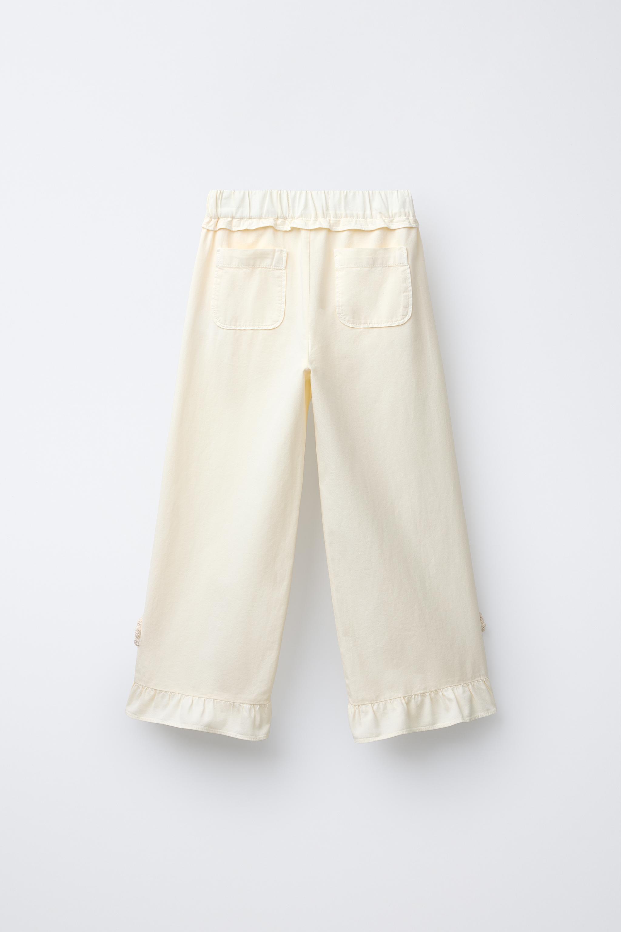 WIDE LEG PANTS WITH CROCHET FLOWER RUFFLES